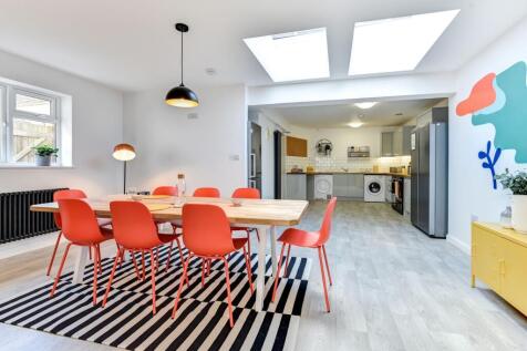 Bright and modern kitchen featuring a spacious ...