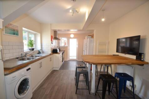 Bright and spacious kitchen featuring modern ap...