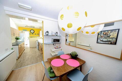 A bright and inviting kitchen area with modern ...