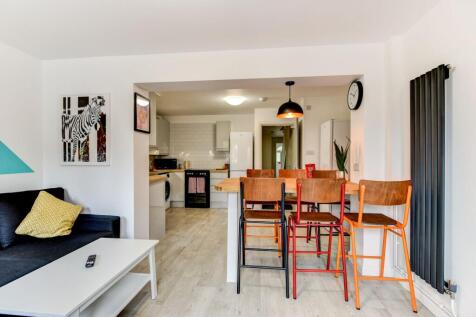 A stylish and inviting living room featuring a ...
