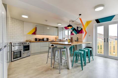 This stylish kitchen features modern appliances...