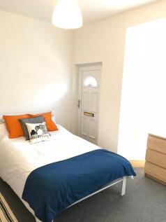 Bright and inviting double bedroom featuring a ...