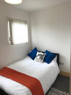Bright and inviting double bedroom featuring a ...