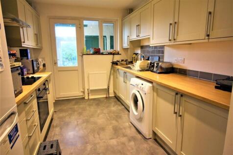 This modern kitchen features ample counter spac...
