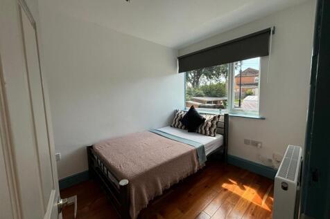 Bright and inviting double bedroom featuring a ...