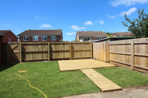 A charming garden area featuring a well-maintai...