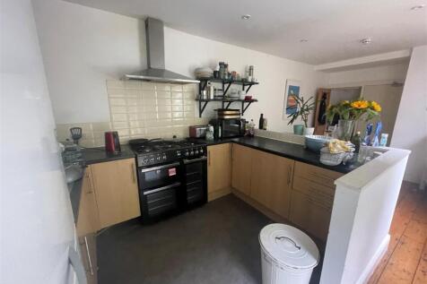 Bright and functional kitchen featuring modern ...