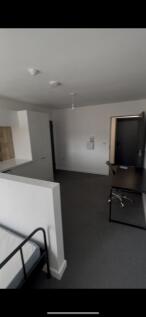 This inviting double bedroom features ample spa...