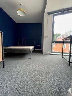 Bright and inviting double bedroom featuring a ...