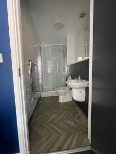 A modern and well-maintained bathroom featuring...