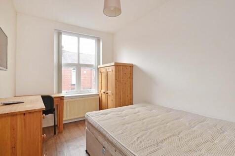Bright and inviting double bedroom featuring a ...