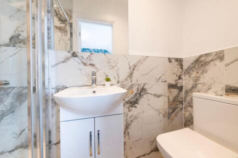 A beautifully designed bathroom featuring elega...