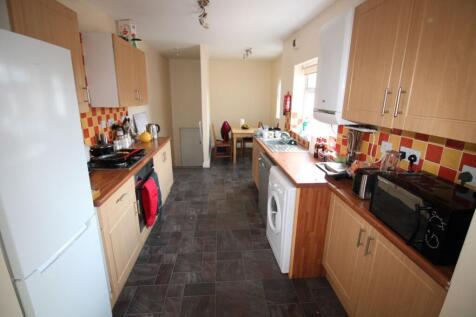Bright and functional kitchen with ample counte...