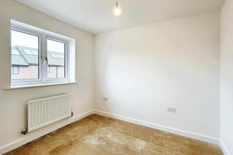 Bright and inviting double bedroom featuring a ...
