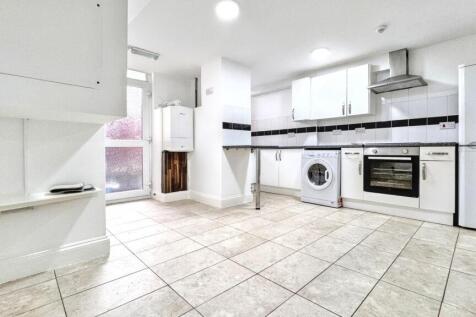 Bright and spacious kitchen featuring modern ap...
