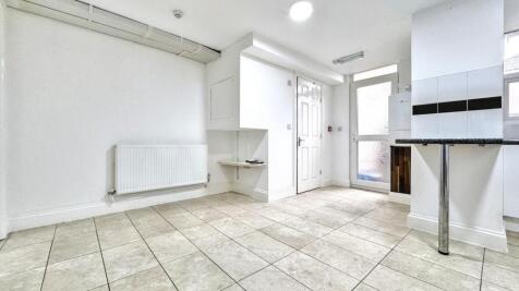 Bright and modern kitchen space with ample room...