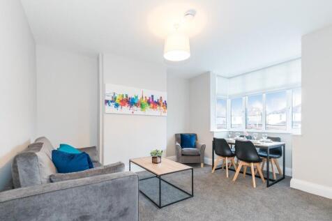 Bright and inviting living room featuring moder...