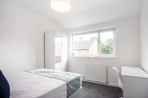 Bright and cozy double bedroom featuring ample ...