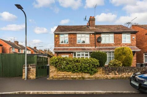 Charming front view of a well-maintained semi-d...