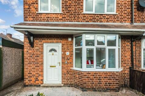 Charming front exterior of a well-maintained pr...