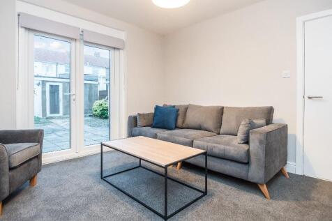 Bright and inviting living room featuring a mod...
