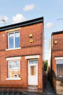 Charming front view of a well-maintained brick ...
