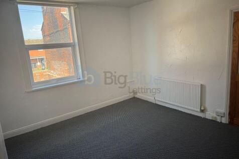 Bright and inviting double bedroom featuring a ...