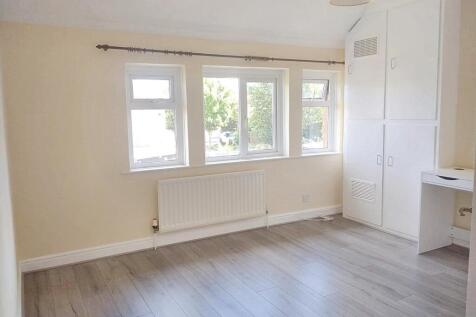 Bright and airy master bedroom featuring light ...