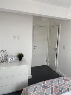 A beautifully presented double bedroom featurin...