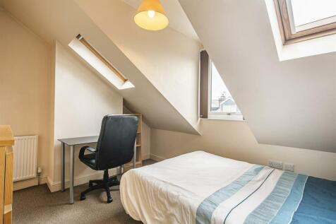 Bright and inviting double bedroom featuring a ...