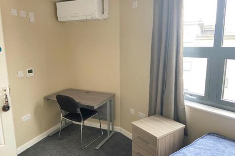 Bright and inviting double bedroom featuring a ...