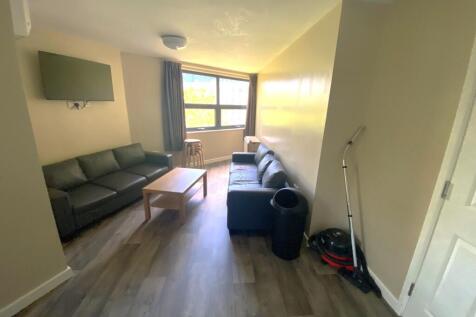 Modern living room featuring stylish seating an...