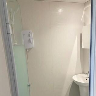 A bright and clean bathroom featuring a modern ...