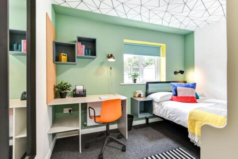 Bright and inviting double bedroom featuring a ...