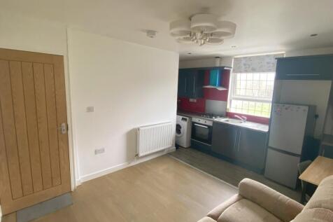 Bright and tidy kitchen space featuring modern ...