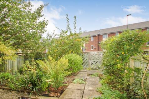 Discover a beautiful garden space featuring vib...