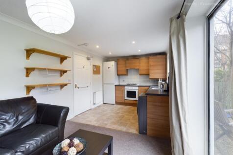 This modern kitchen features ample counter spac...