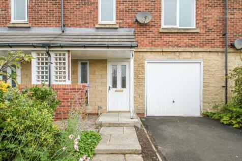 Welcoming entrance to a charming property featu...