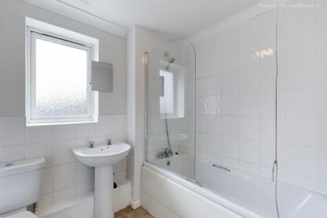 Bright and inviting bathroom featuring a modern...