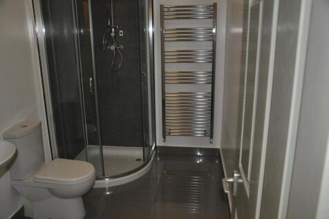 A modern and clean bathroom featuring a sleek s...