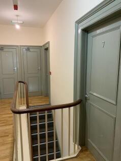 Bright and well-maintained indoor staircase are...