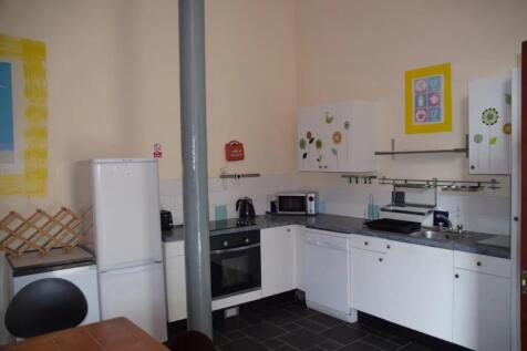A bright and cheerful kitchenette featuring mod...