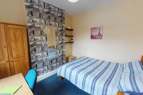 A cozy and well-decorated double bedroom perfec...