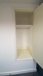 A clean and well-maintained built-in storage cl...
