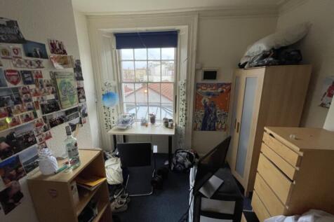 Bright and cozy double bedroom featuring large ...