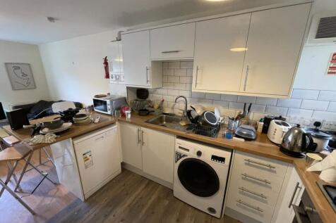 Bright and functional kitchen space featuring a...