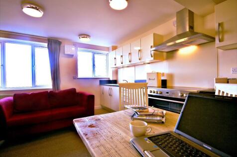 Bright and inviting living room featuring a com...