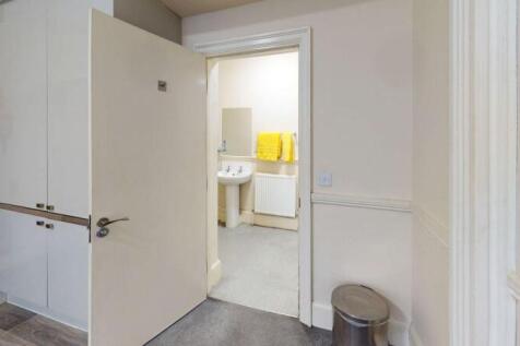 A clean and well-maintained bathroom featuring ...