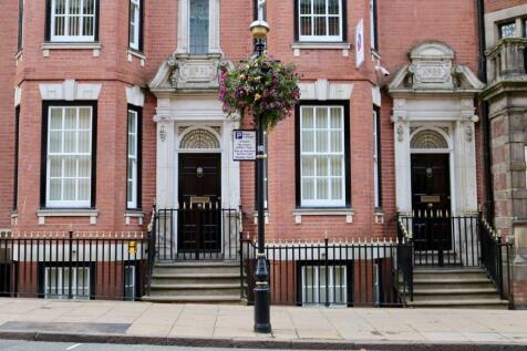 Elegant terraced property with classic red bric...