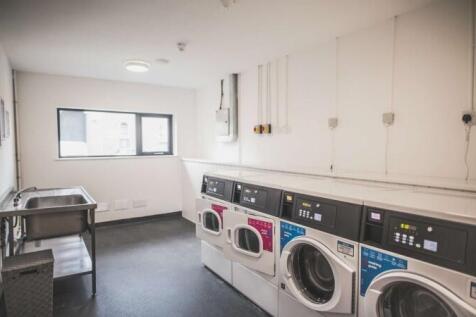 A clean and well-maintained laundry room featur...